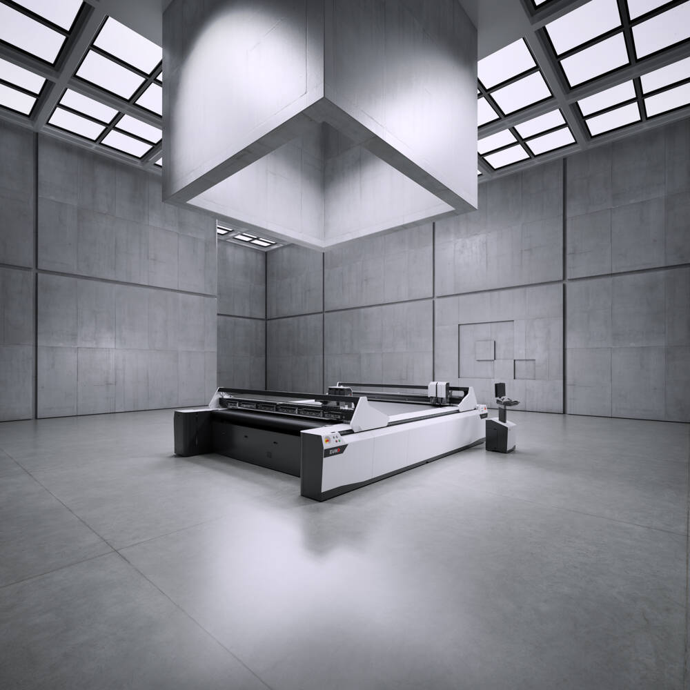 Zünd G3 L cutting system with a control panel in a modern, minimalist concrete room with overhead lighting. Zünd G3 L cutting system with a control panel in a modern, minimalist concrete room with overhead lighting.