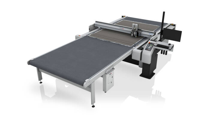 Cortadora digital Zünd G3 con extensión frontal después de limpiar el área de descarga mediante la limpieza de la cinta transportadora. Cortadora digital Zünd G3 con extensión frontal después de limpiar el área de descarga mediante la limpieza de la cinta transportadora.