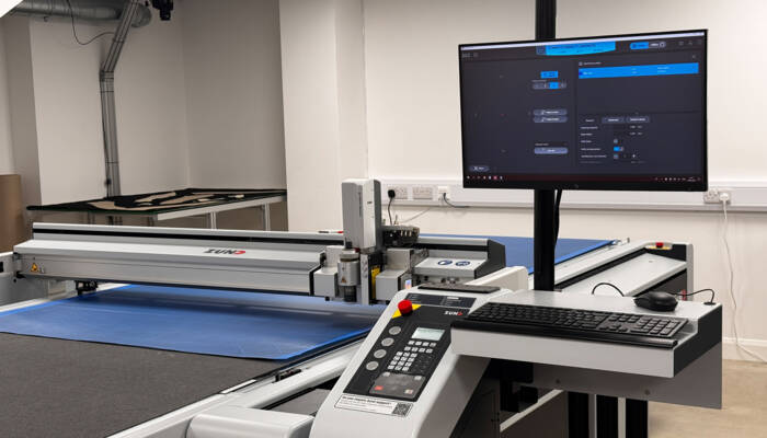 A fully conveyorised flatbed cutter delivering precision kits with unparalleled quality and efficiency. Jota Composites Zund Cutter